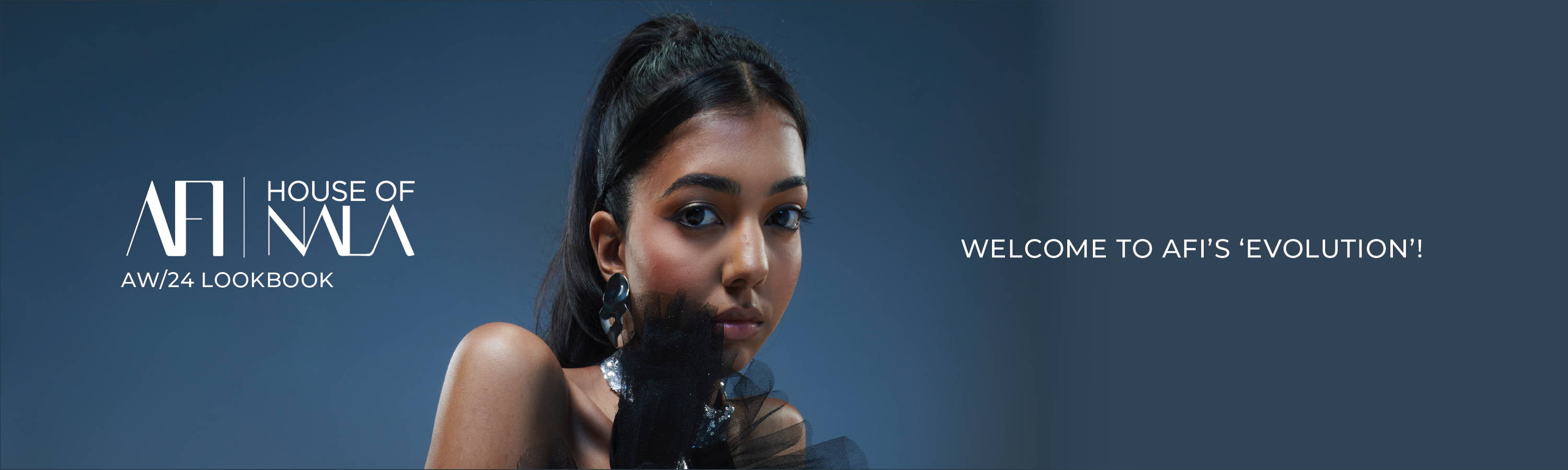 Model, Natanya Chetty wearing a silver dress with black tulle, sitting down in front of a grey background. The banner image has writing: 