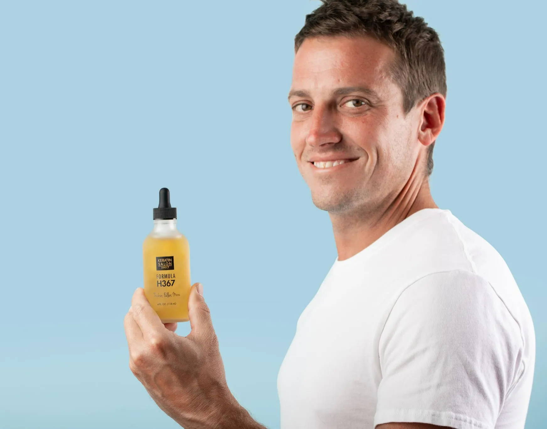 Man with hair growth product
