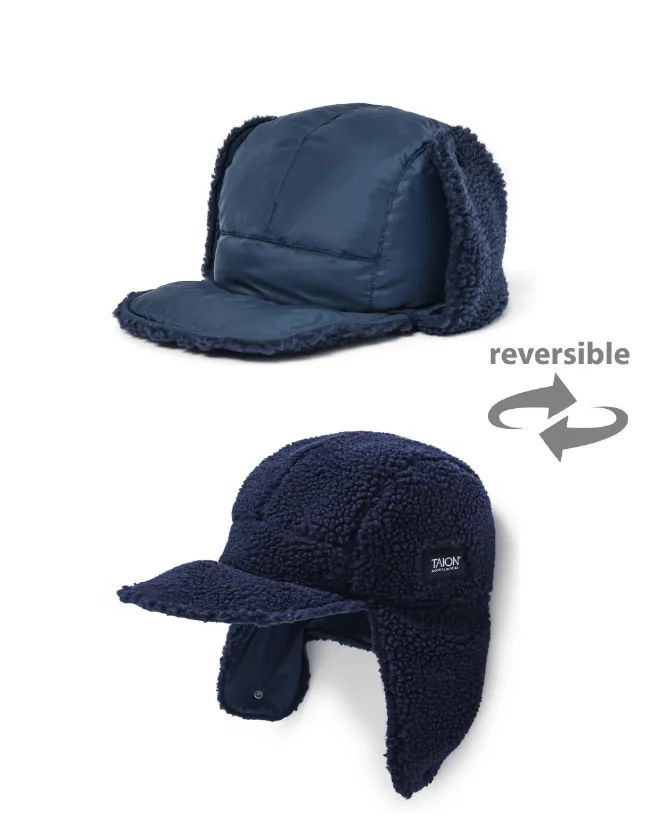 Reversible winter hat with ear flaps, shown in two styles.
