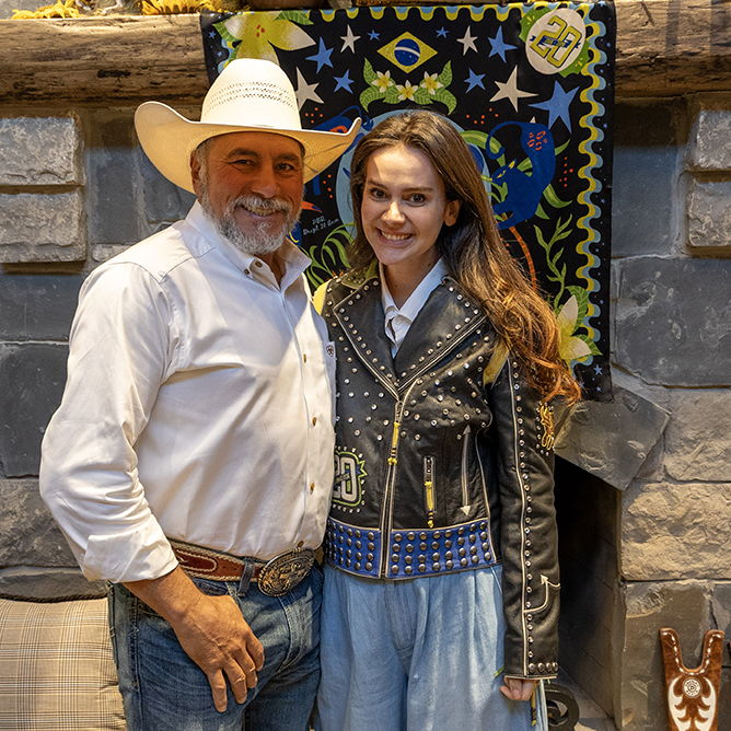 Adriano Moraes with his daughter-in-law, Julia. 