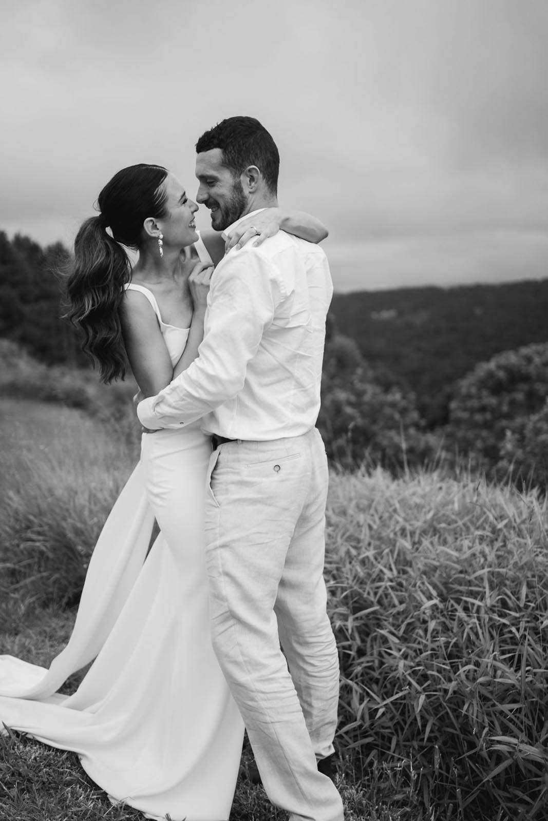 Bride and Groom holding each other