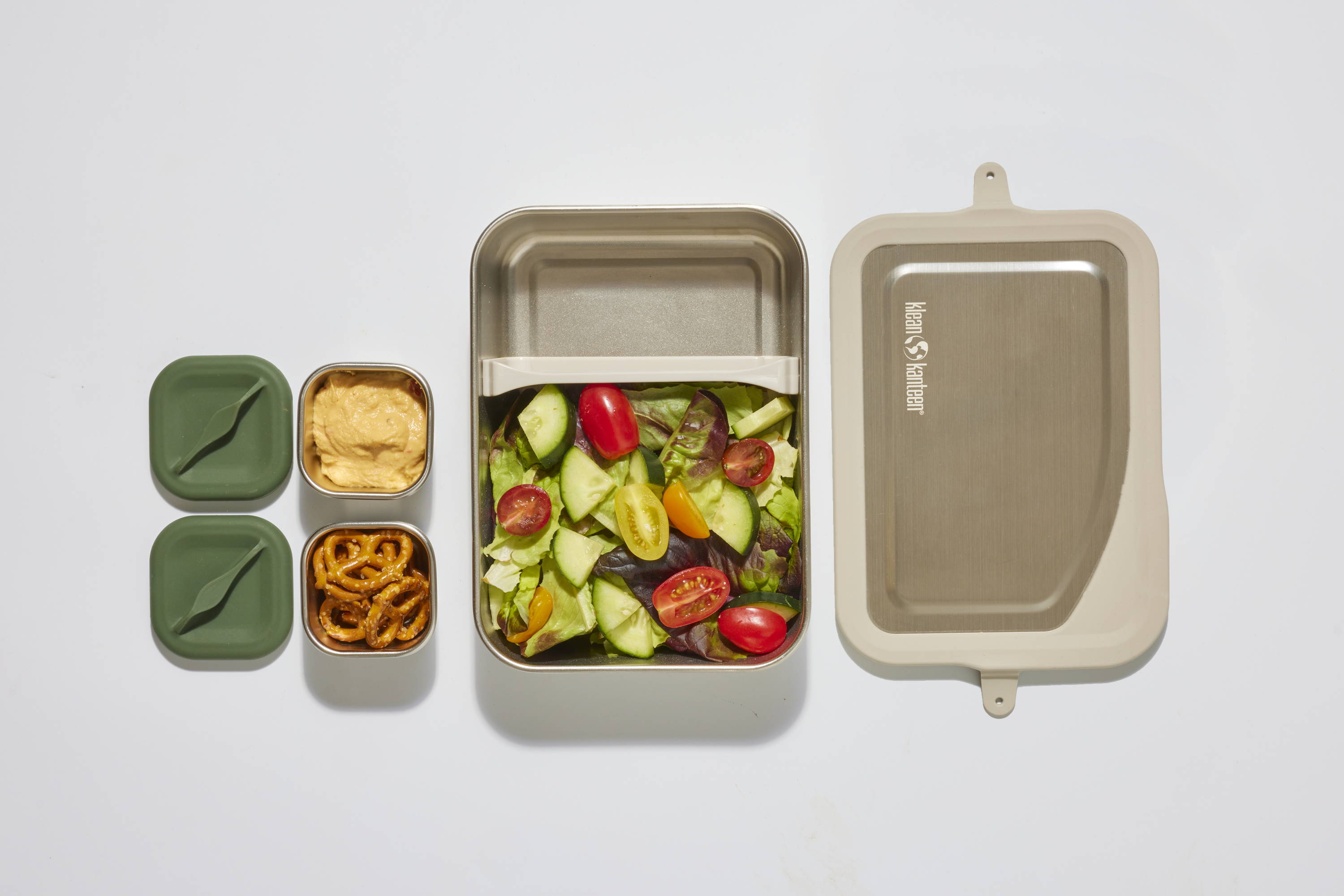 Steel lunch box with divider and snacks