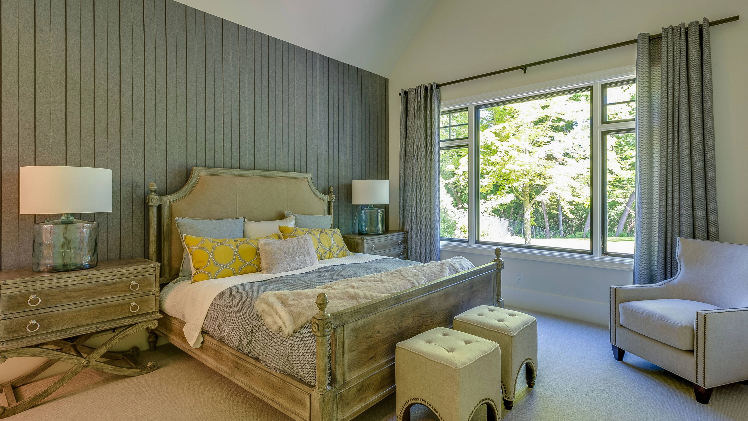 a rustic bedroom with a large window