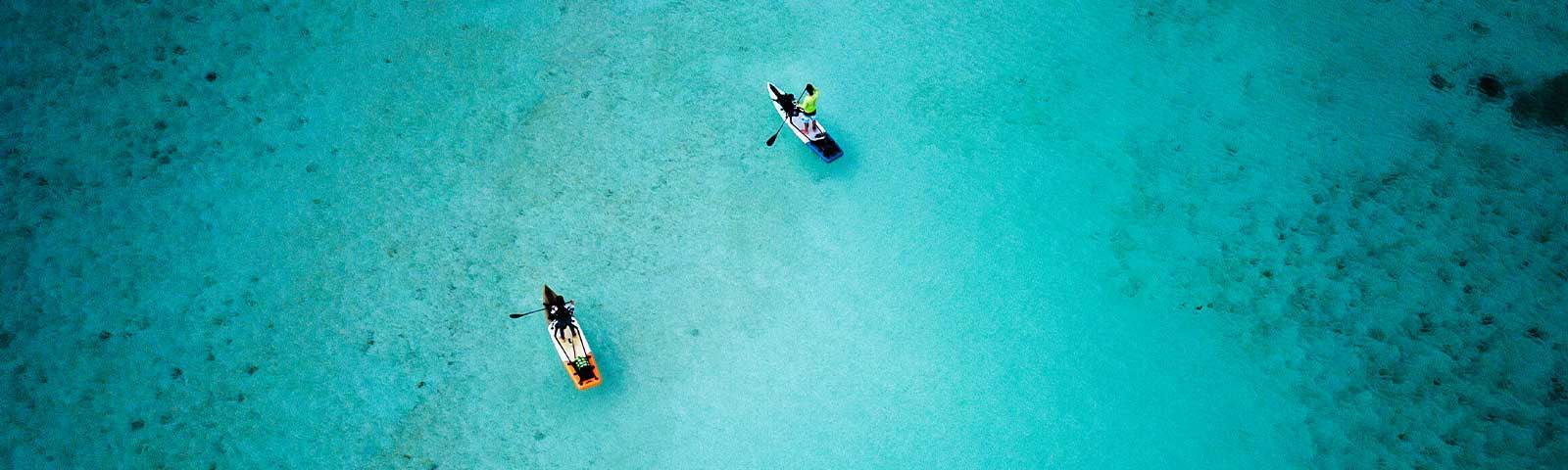 Paddleboarding across the ocean in barbuda