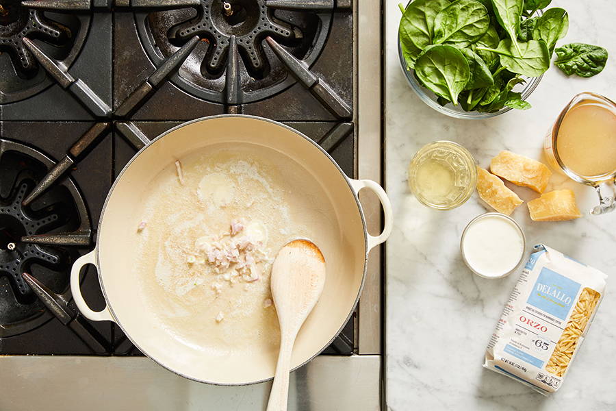 Butter and shallot cooking in pan