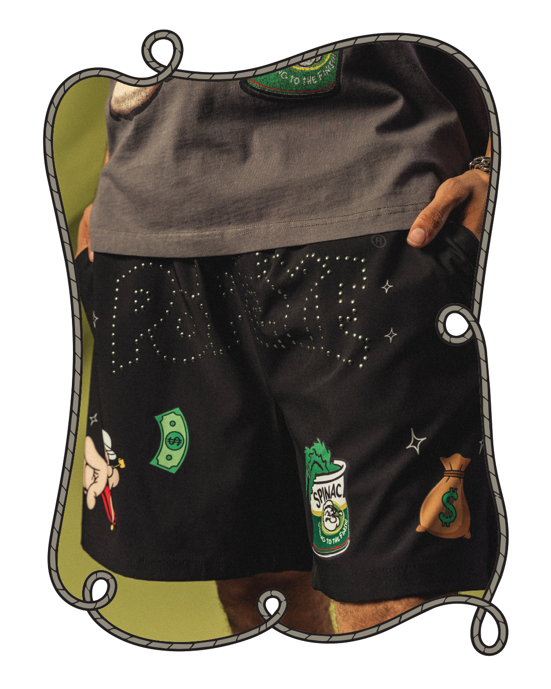 Black shorts with money and cartoon designs.
