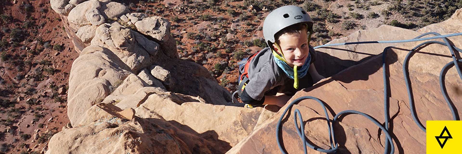 Rob Pizem climbing with his son