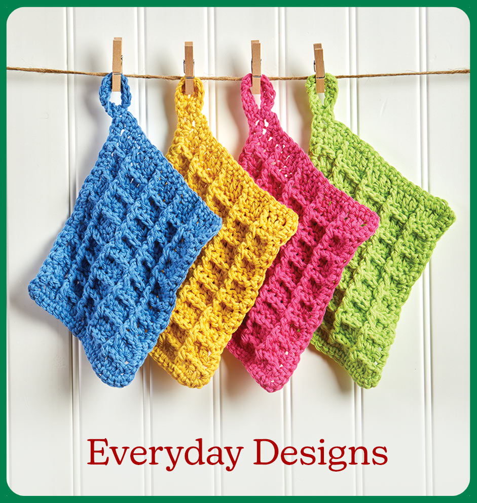 Colorful crocheted dishcloths hanging on a line with the text 