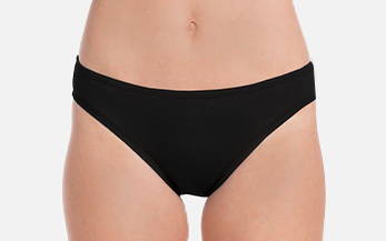 Front image, close-up of model wearing black hipster swimsuit bottoms.