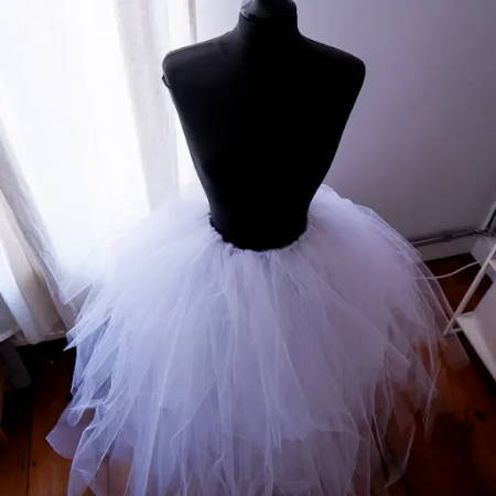 Top view on a diy tutu skirt, dressed on a black mannequin