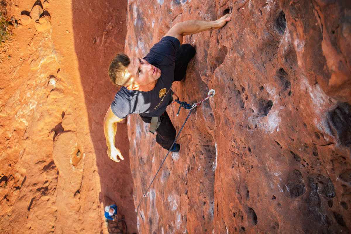 Ambassadors Tim McComsey Rock climbing | Your Health Is A Journey, Not A Destination