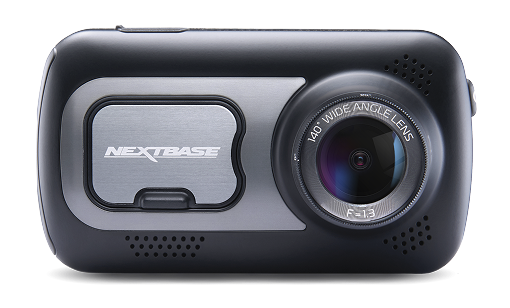 A black Nextbase dash cam with a lens and logo.