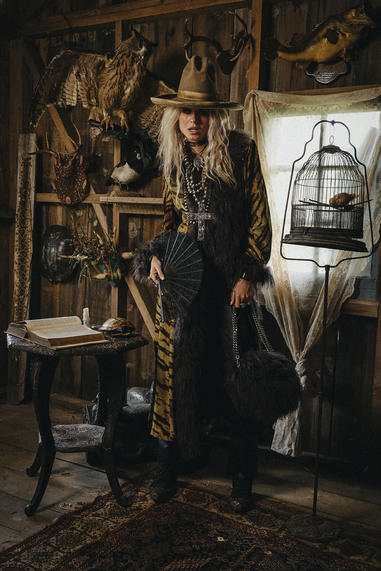 Haley wearing the La Muse Sauvage Duster with Double D Ranch jewelry and accessories.