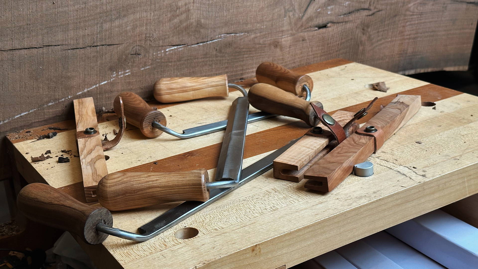 drawknives on a workbench