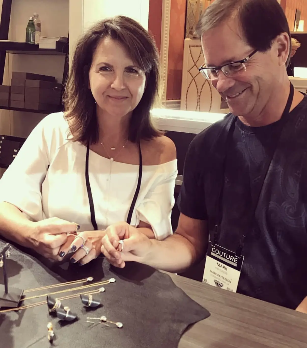 Nina and Mark looking at jewelry 