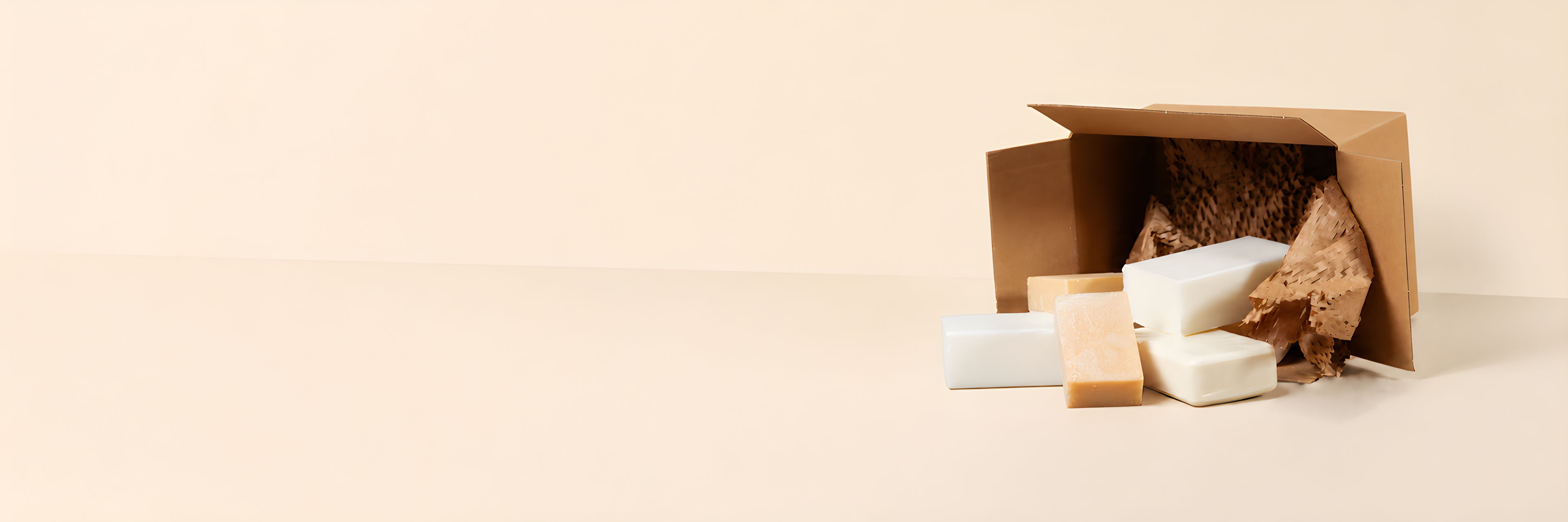Open cardboard box with packing materials and items inside.