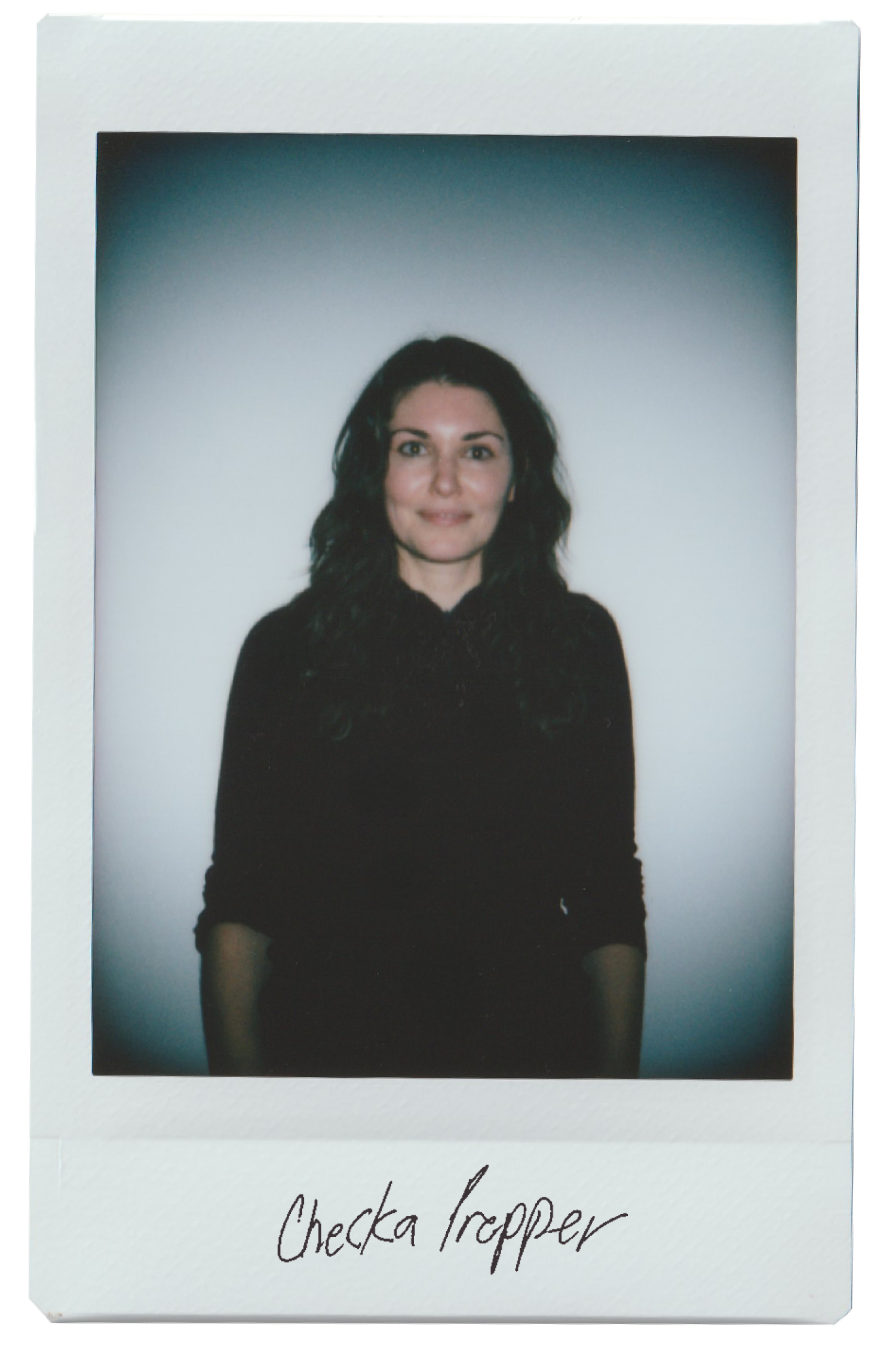 Portrait of a woman with dark hair against a neutral background.