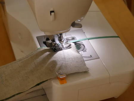 Elastic band placed as seam guide