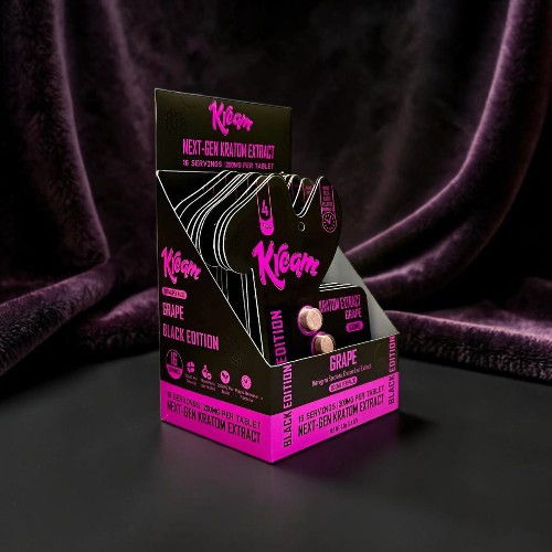 Display stand for Klean beauty products with black and pink design.