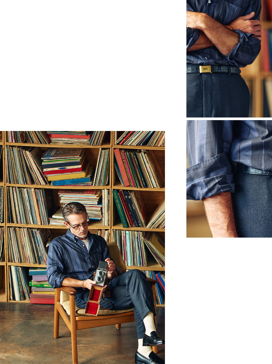 Person sitting in a chair surrounded by vinyl records.