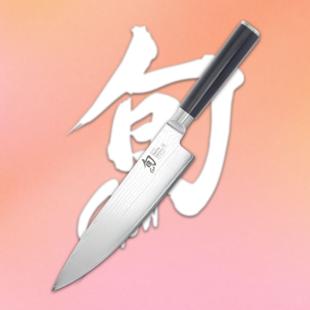 A chef's knife on a colorful background with Japanese characters.