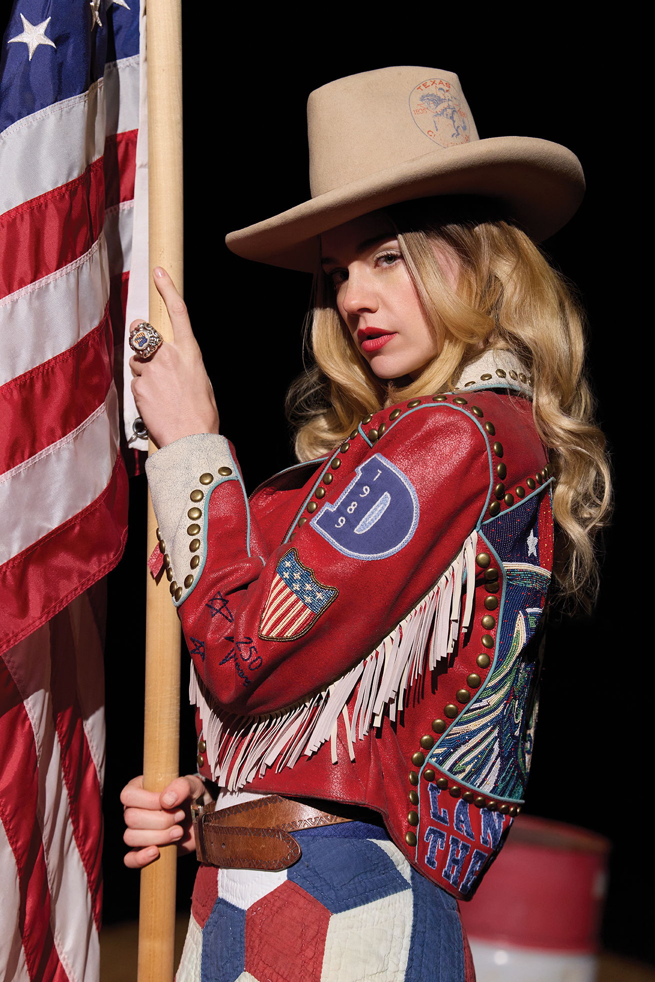 Lozzie wearing the Lady Liberty Biker Jacket with the Lady Liberty Skirt and vintage Double D Ranch Accessories.