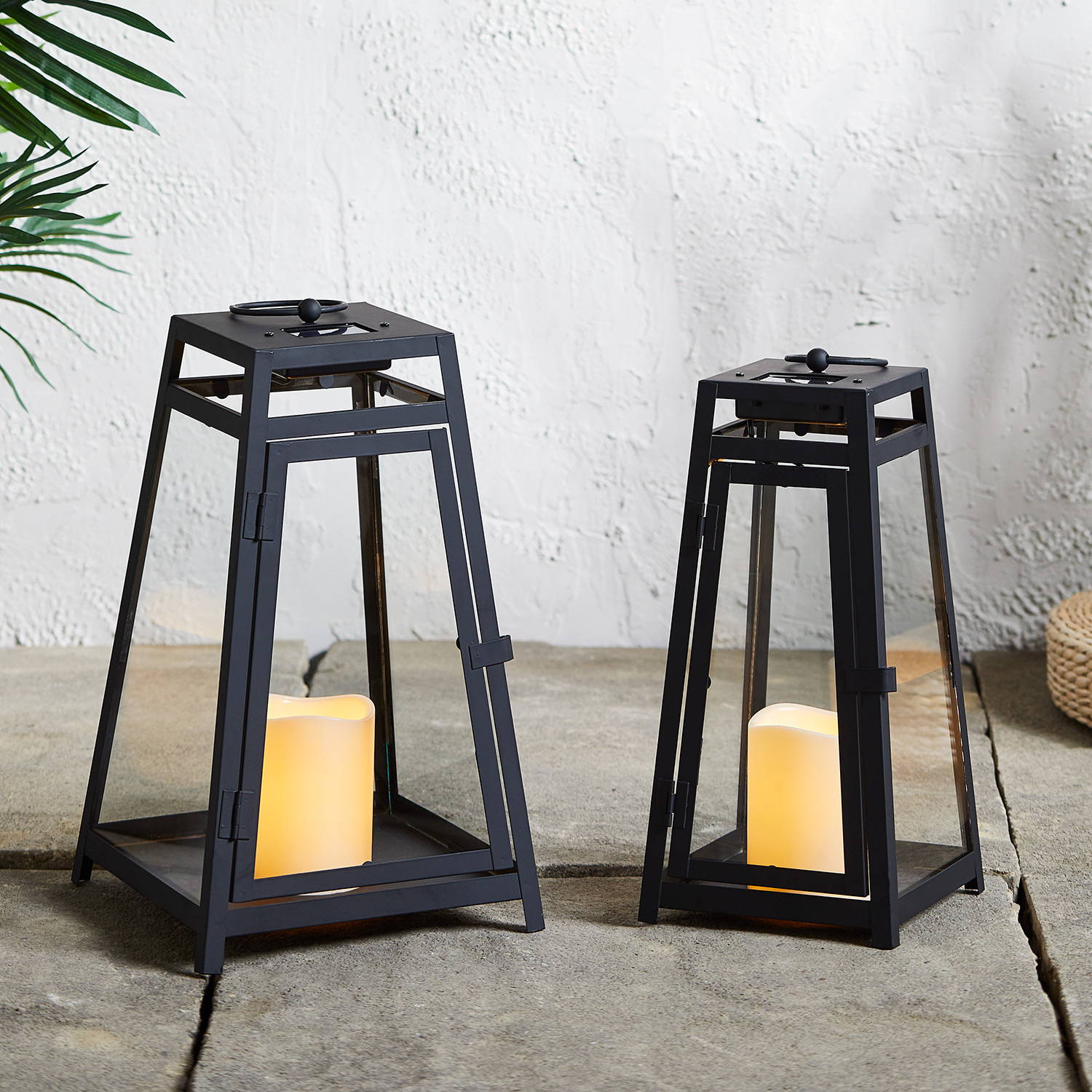 Lismore solar lantern duo illuminated on patio