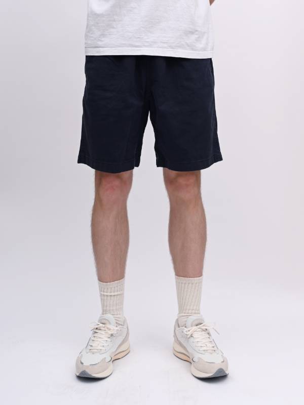 A model wearing Gramicci G-Shorts.