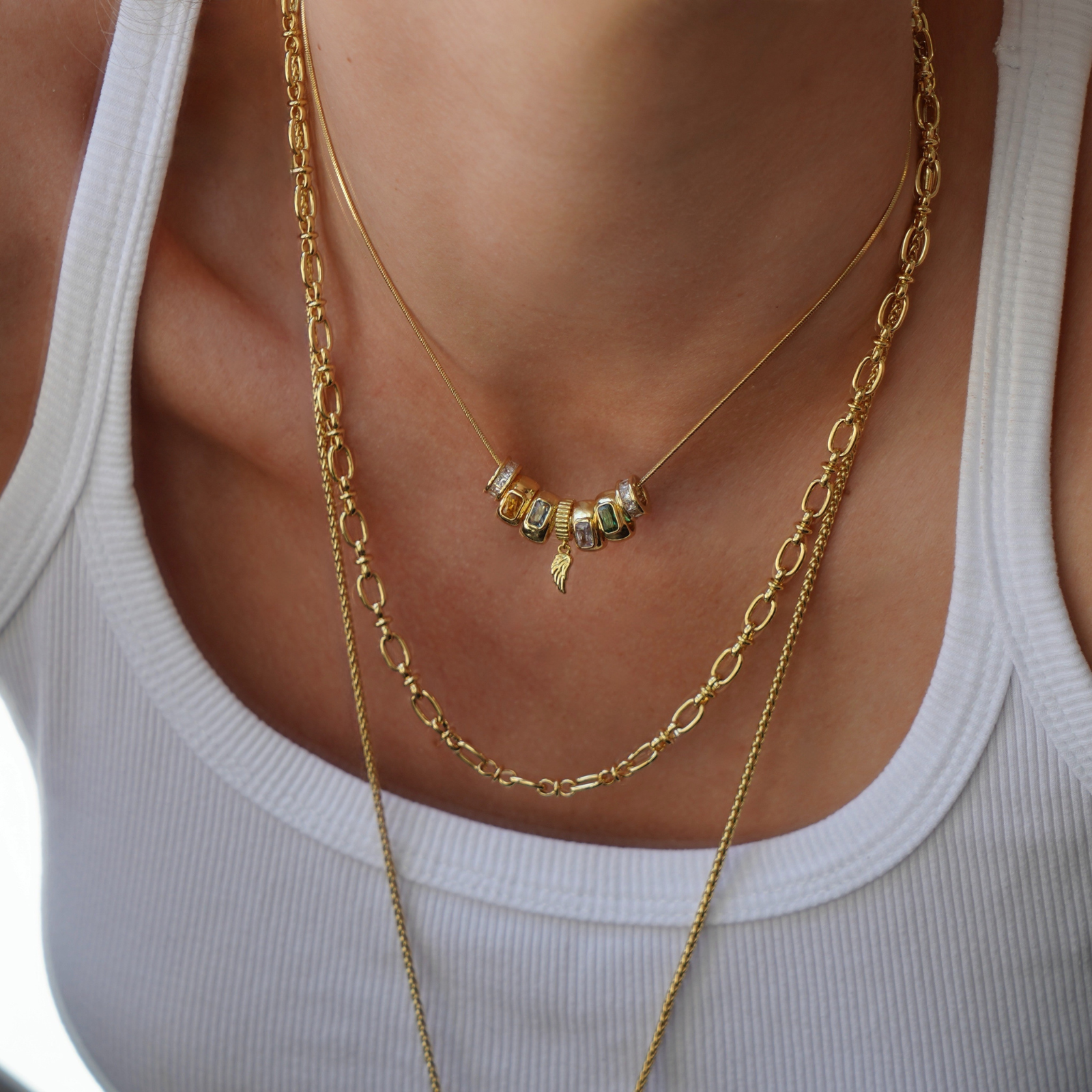 Gold halo spacer charms with multicolor crystals for custom charm jewelry design