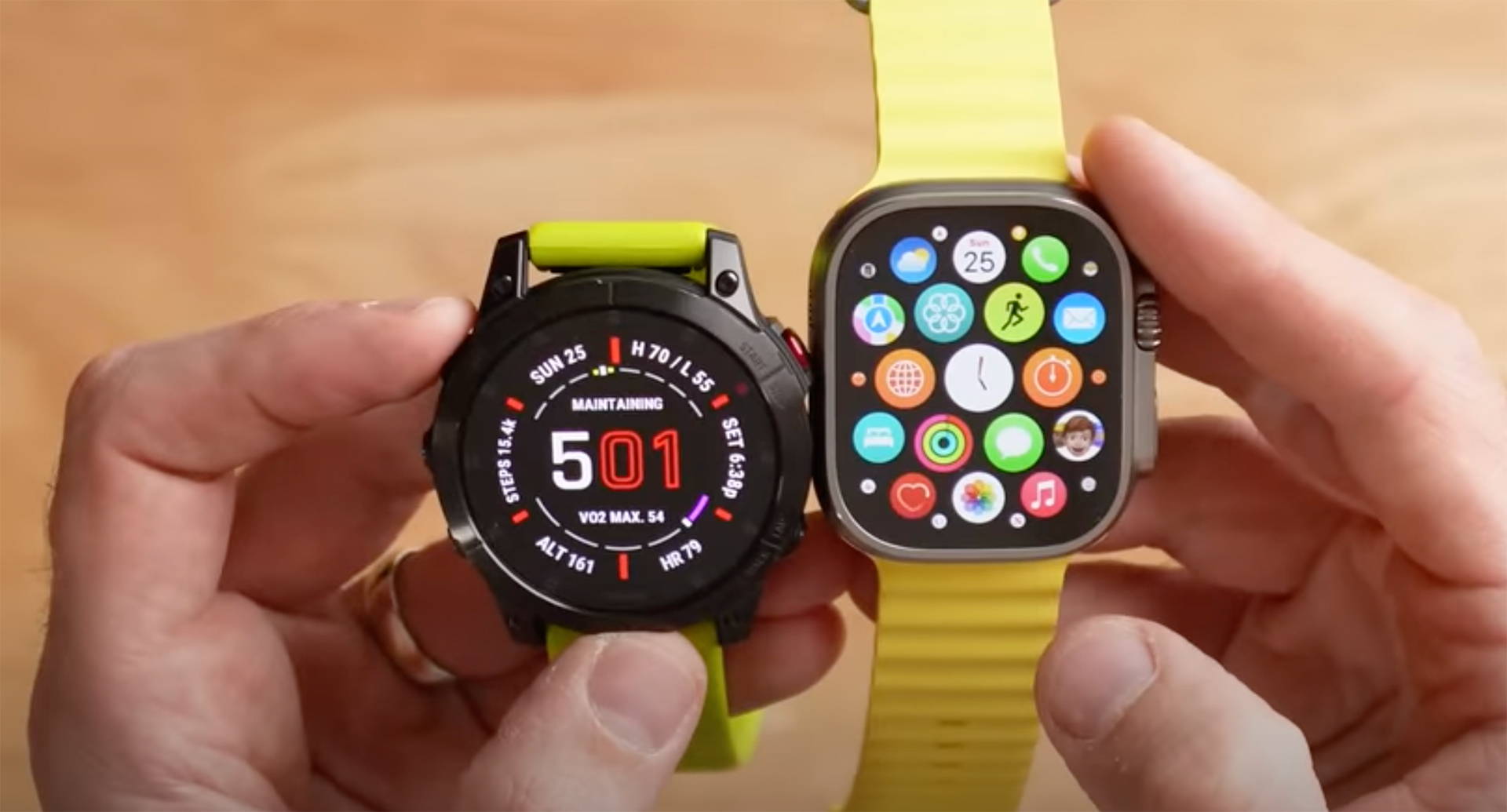 A closeup of two hands holding the Garmin epix (Gen 2) and Apple Watch Ultra GPS watches