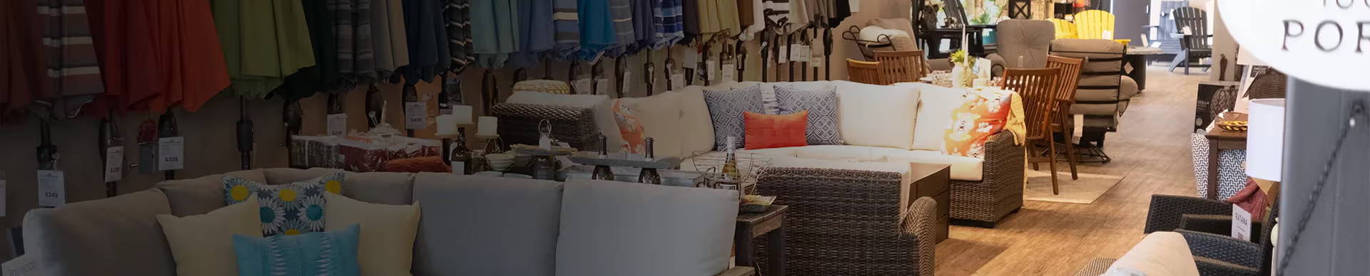 Interior of a furniture store showcasing various seating options and decor items.