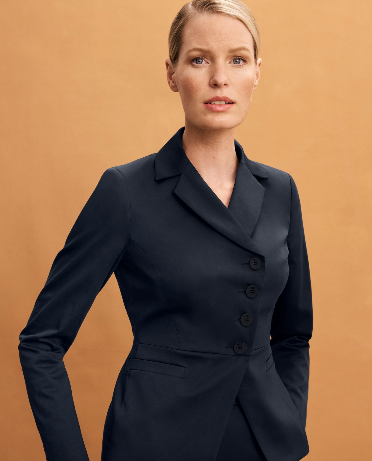 Model wearing navy Cecille cotton jacket