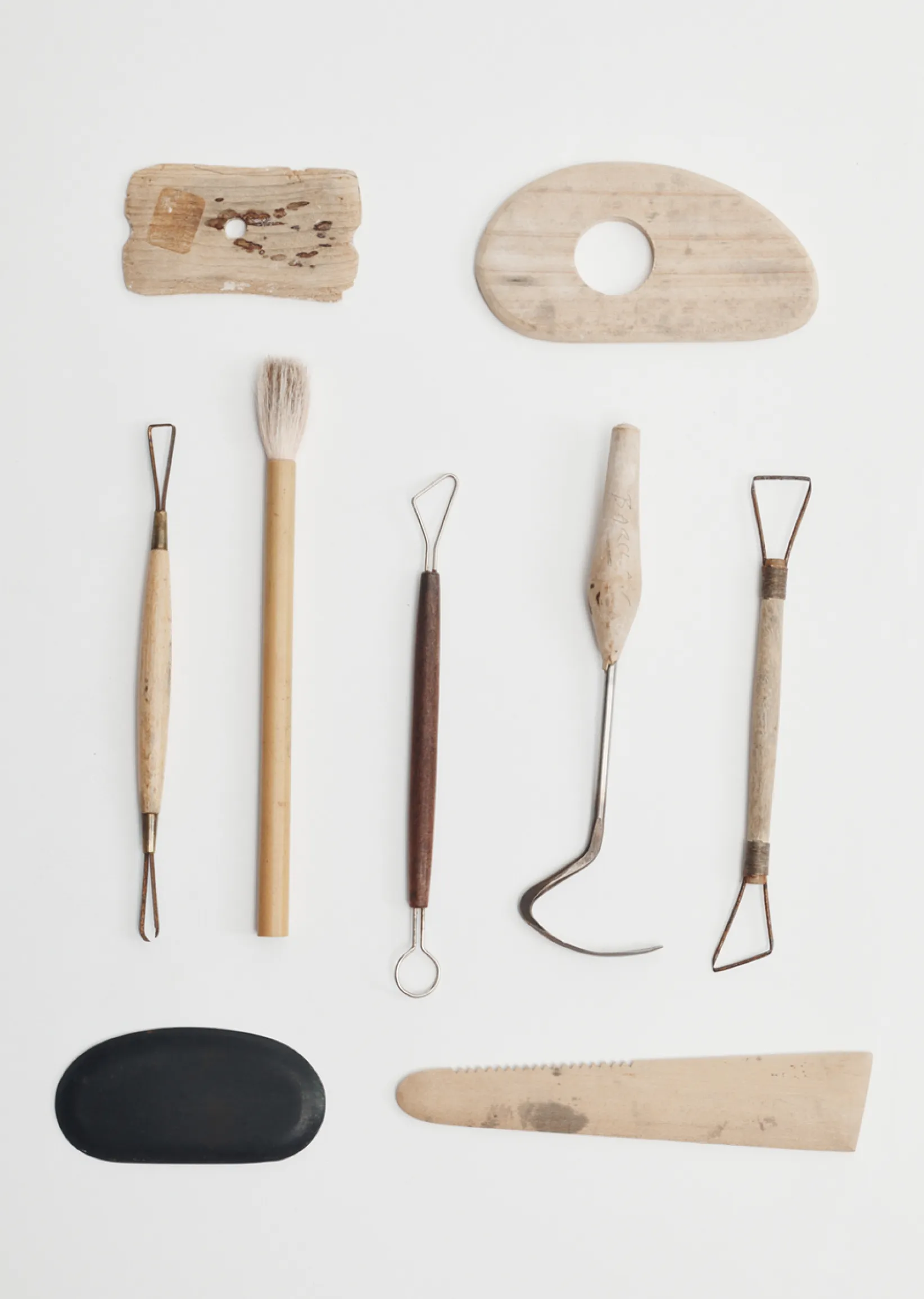 Art tools arranged on a white background.