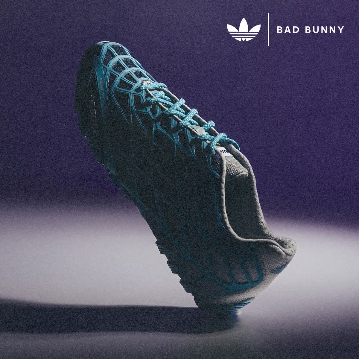 Adidas shoe designed in collaboration with Bad Bunny, set against a purple background.