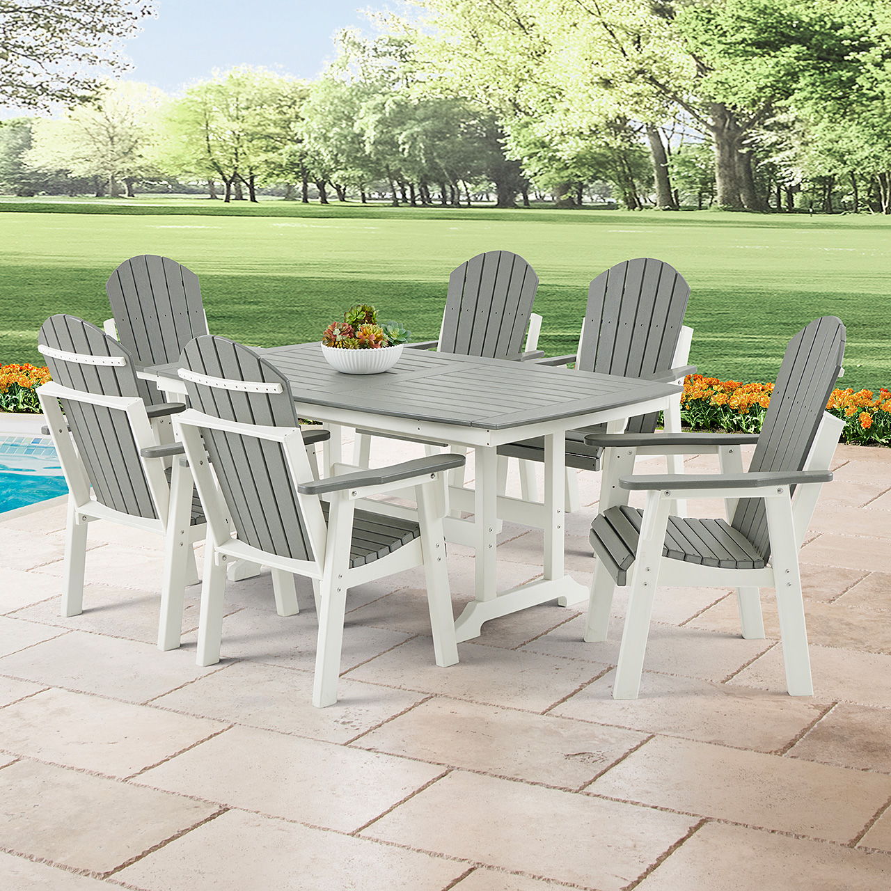 Outdoor dining set with a table and six chairs on a patio.