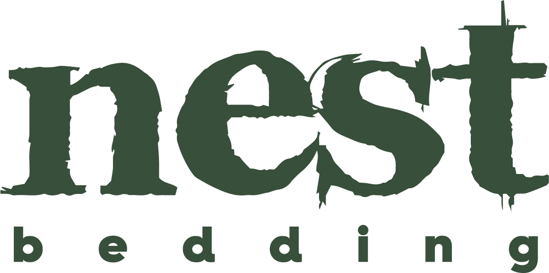 nest bedding logo