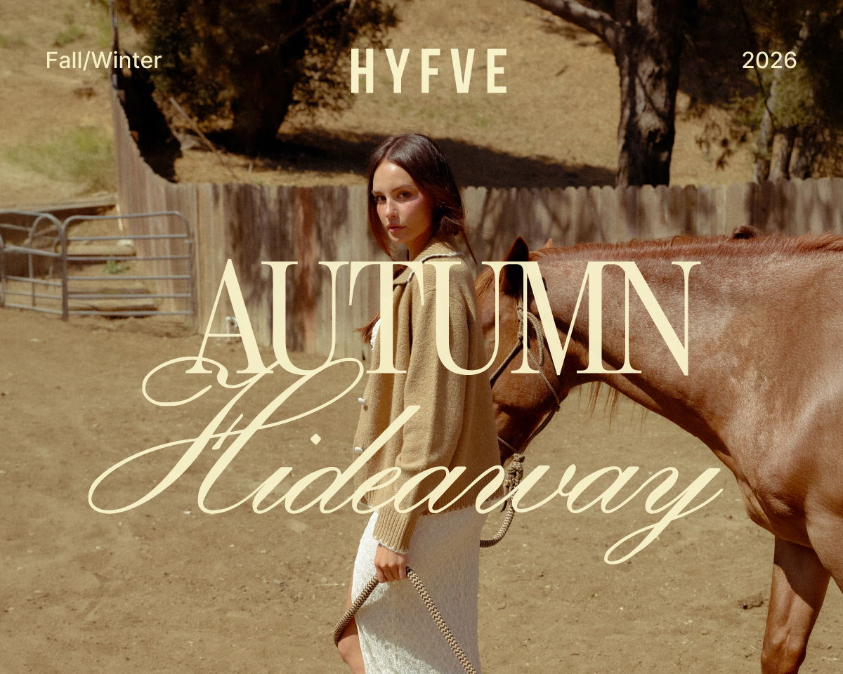 Woman in a white dress near a horse, with 