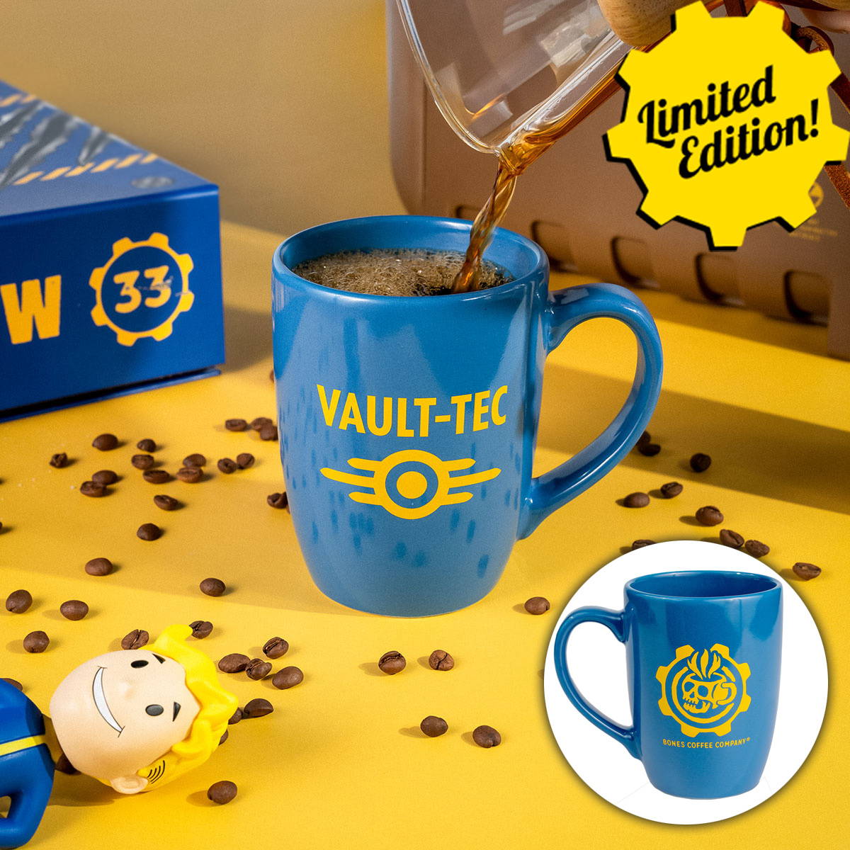 A blue ceramic Vault-Tec mug with coffee being poured into it. There are coffee beans,a Vault-Boy Bobblehead, and the Fallout Collector’s box nearby. It says Limited edition and has a picture of the Bones Coffee Company logo side of the mug on it.