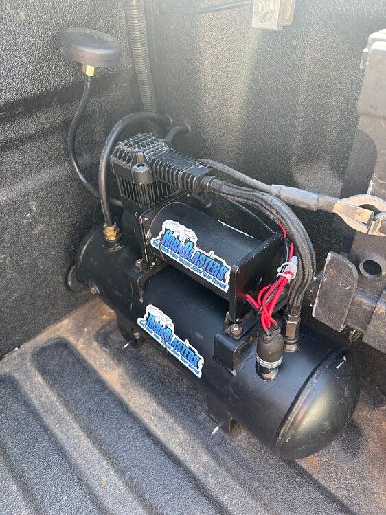 Side profile of 2020 Ford F350 with Conductor's Special train horn kit install HornBlasters gallery photo 2