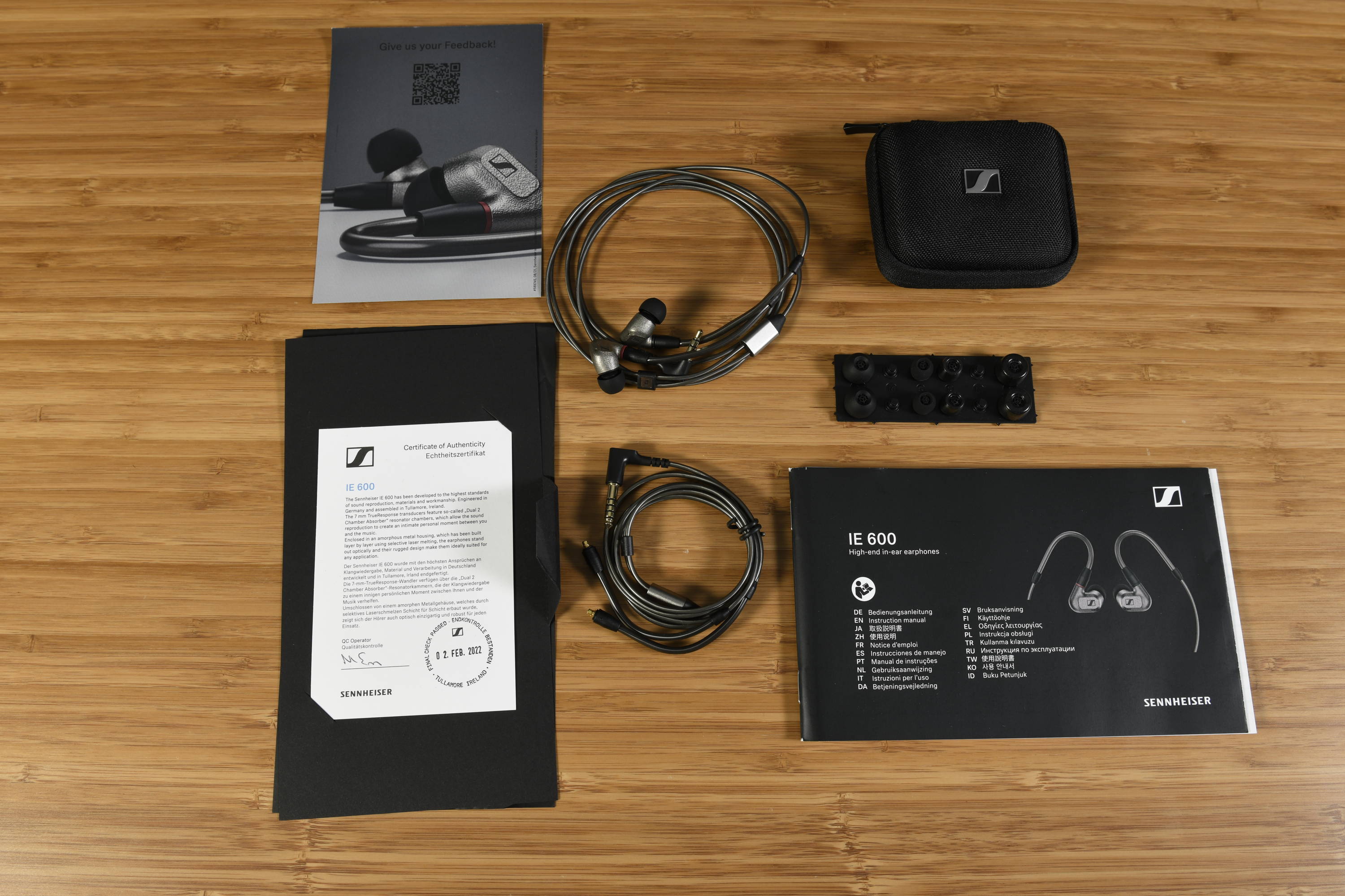 Sennheiser IE 600 and box contents spread out on table 