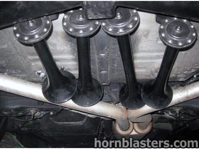 Four horns undercarriage above dual exhaust muffler Wesley's 2008 Toyota RAV4 228H gallery photo 9