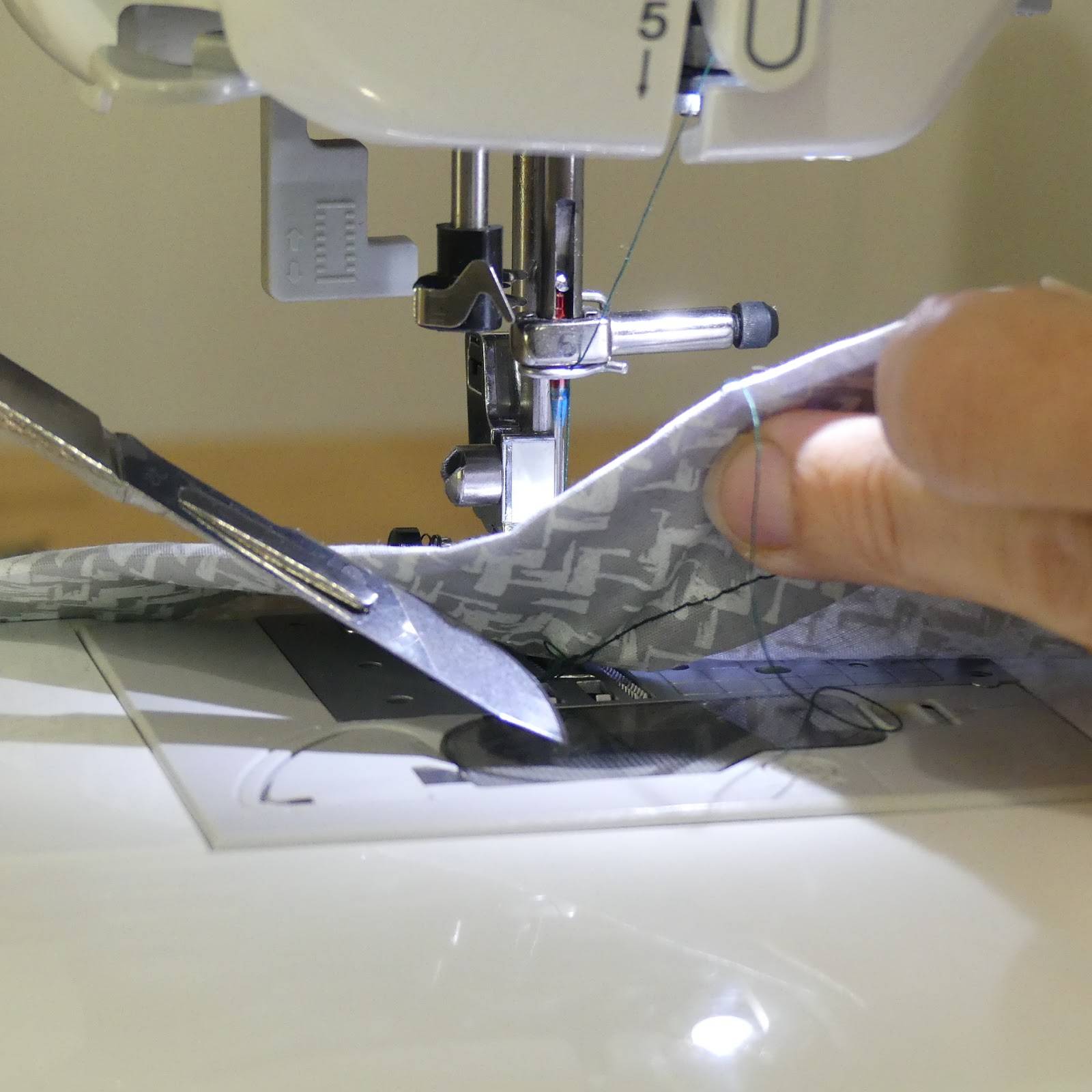 cutting thread knot on a sewing machine