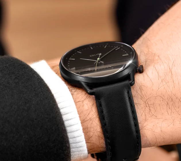 black vegan leather watch strap on arm