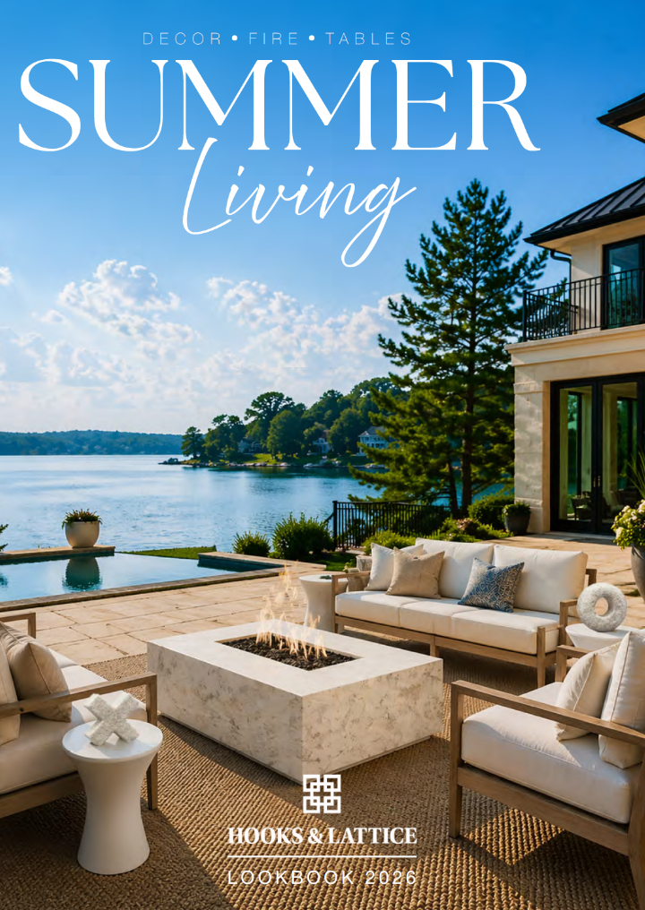 Cover of a summer living magazine with outdoor furniture and a lake view.