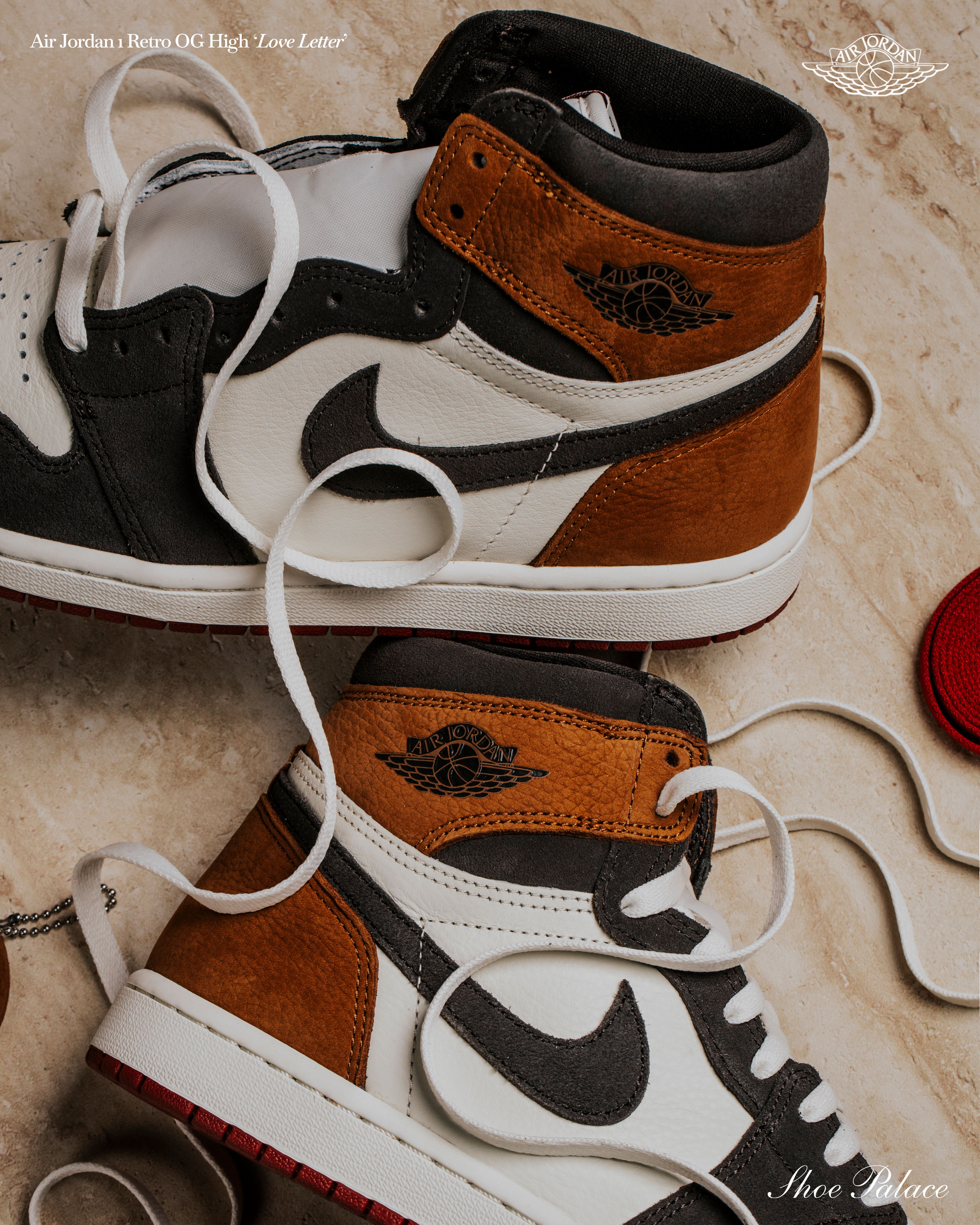 A pair of stylish high-top sneakers with laces.