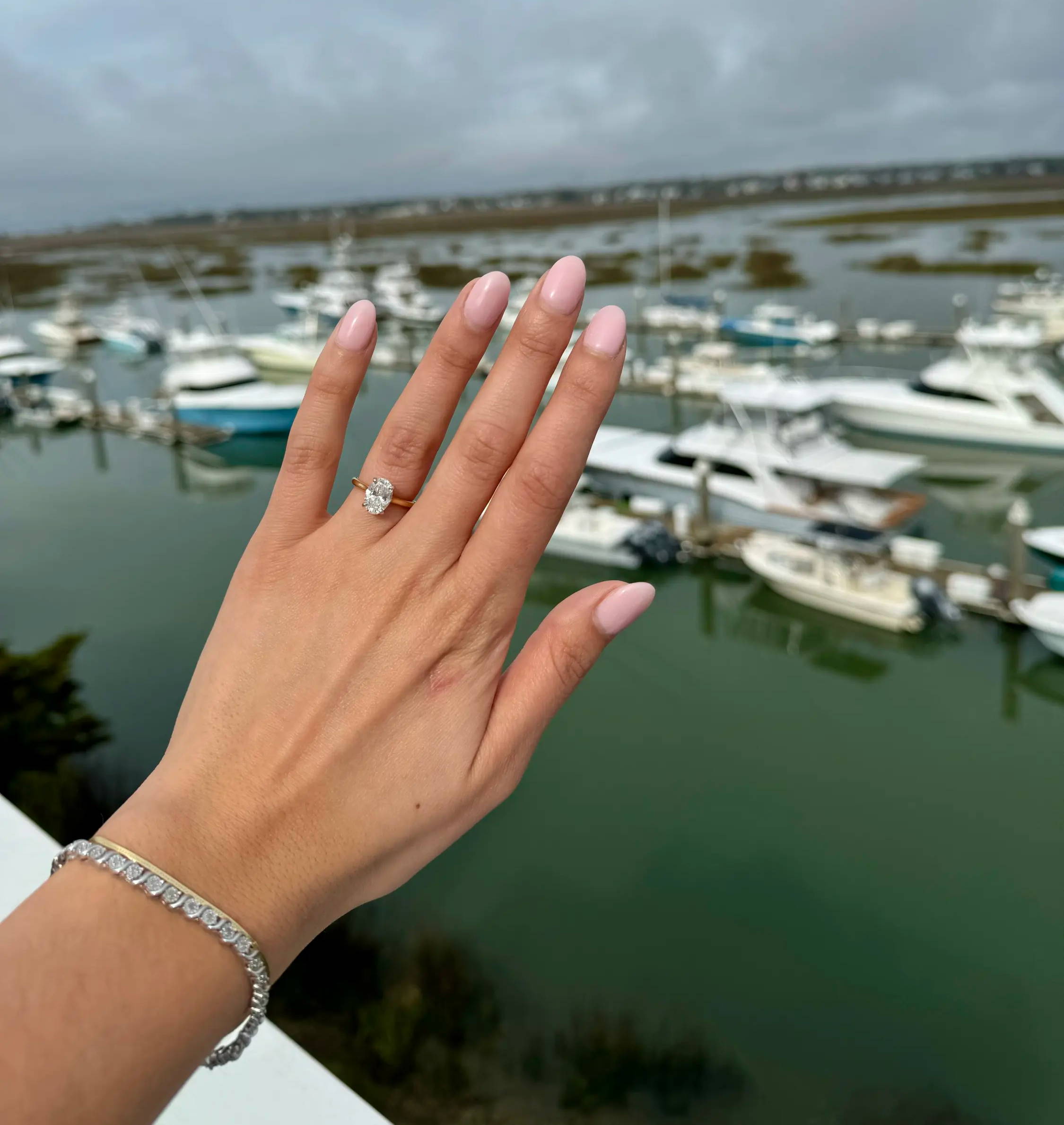Lauren's oval diamond solitaire engagement ring