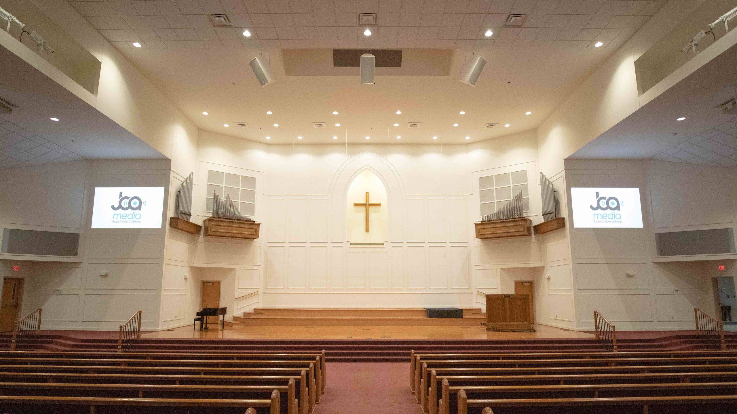 Church sanctuary interior with installed AV sound system
