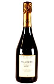 Bottle of Egly-Ouriet Champagne with a gold foil cap.