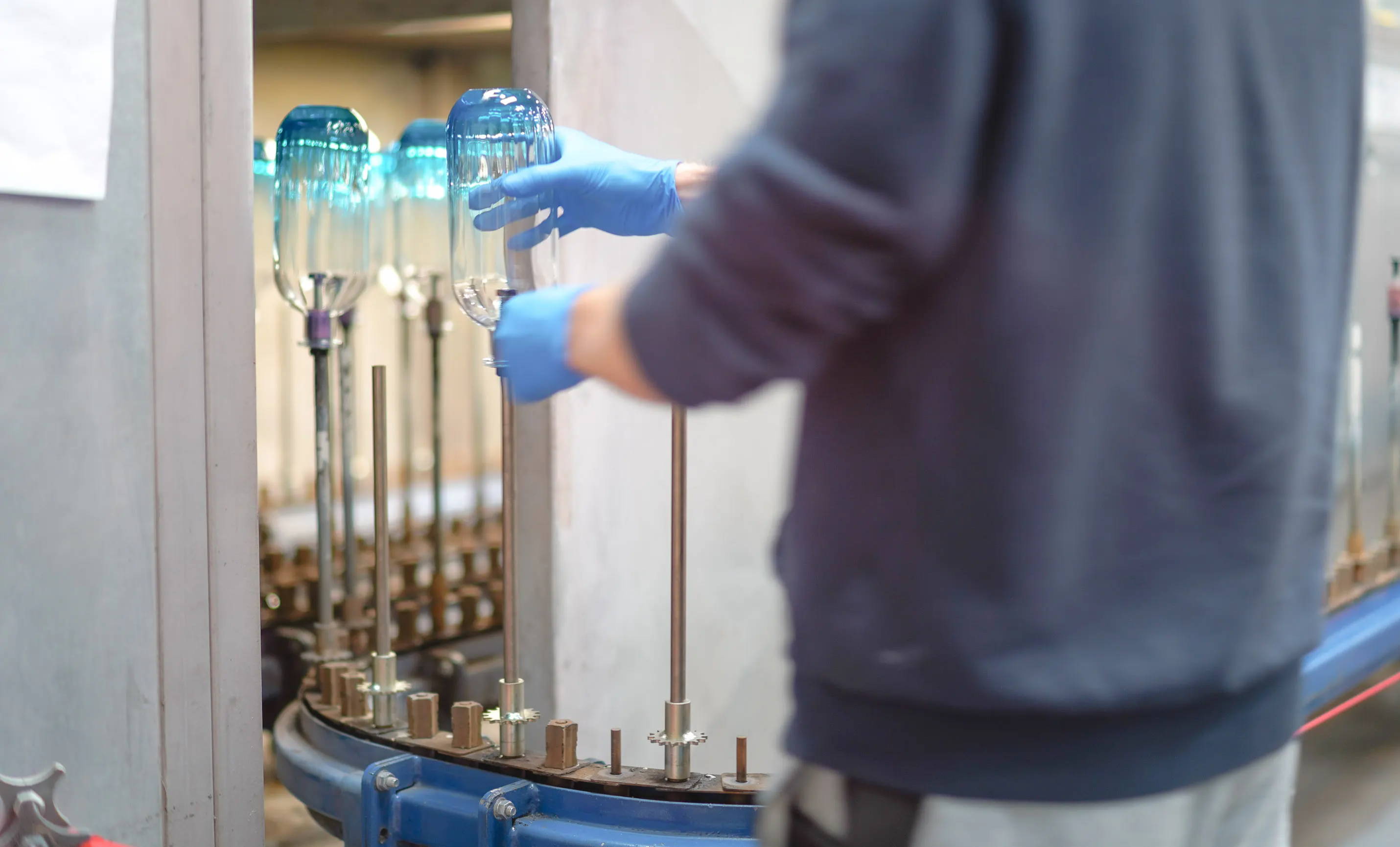 Glass bottles for drinks being made