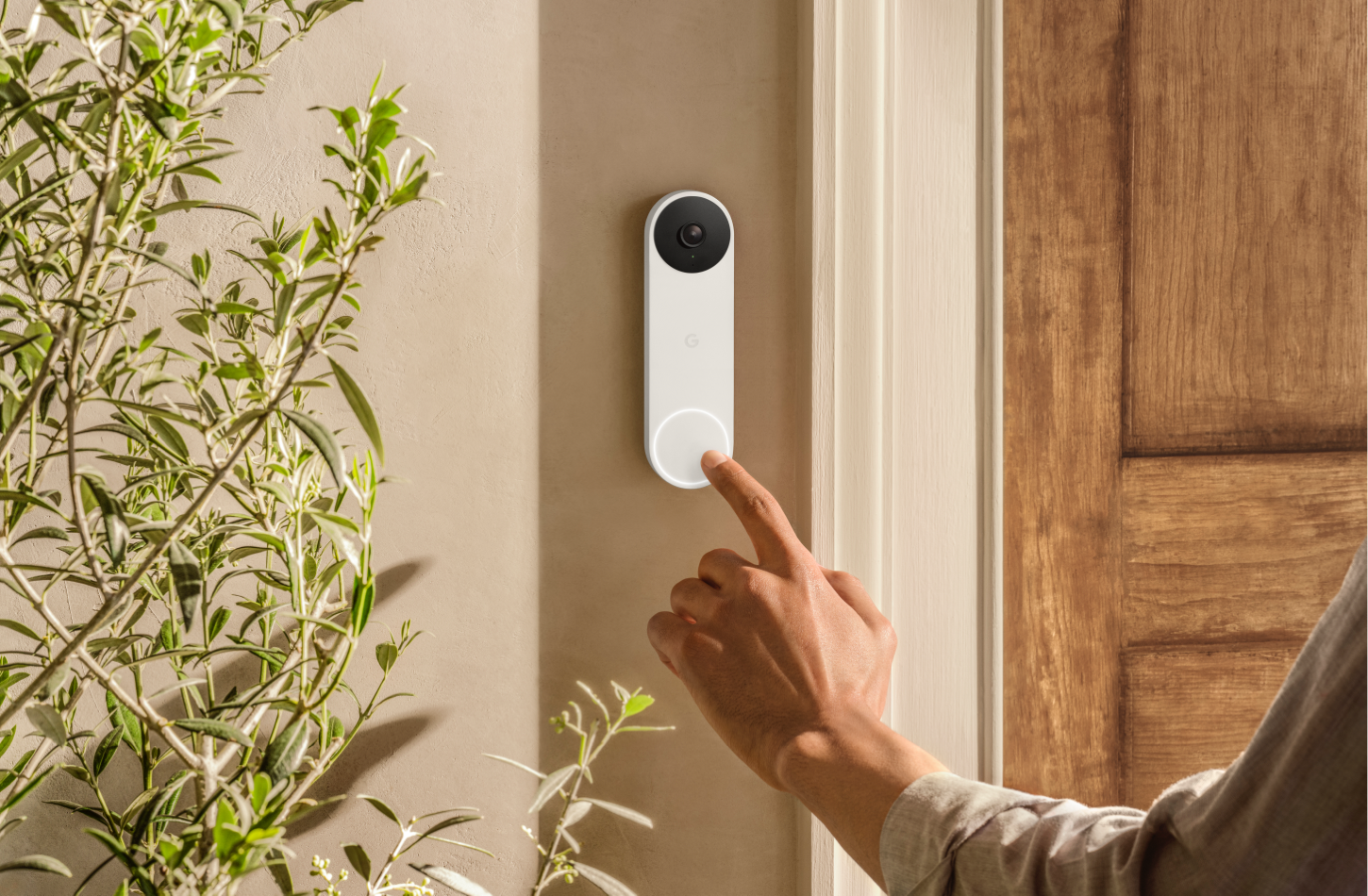 visitor ringing a Nest smart video doorbell installed by OnTech